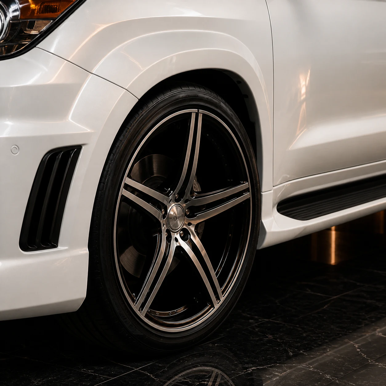 LX570 Sport Aero Black Edition 2008–2012 historical design reference — wheel arch and running board detail